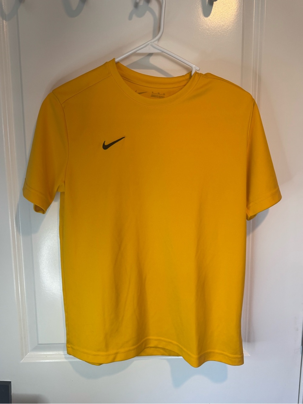 Nike women’s  Yellow Dri-FIT Short Sleeve Shirt